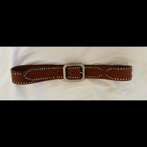 Lucky brand studded belt with large belt buckle.